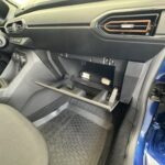 Boite à gants ouverte d'une Dacia Sandero Stepway 3